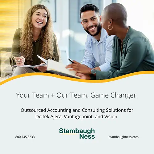Three professionals smile and discuss paperwork at a table. The image promotes Stambaugh Ness's outsourced accounting and consulting solutions for Deltek Ajera, Vantagepoint, and Vision.