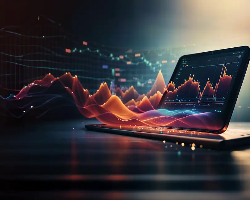 A laptop displaying data charts and colorful 3D graphs sits on a desk. The text reads: "Smart Data Management: Data Conversion vs. Data Migration" by Michael Diorio, Stambaugh Ness.