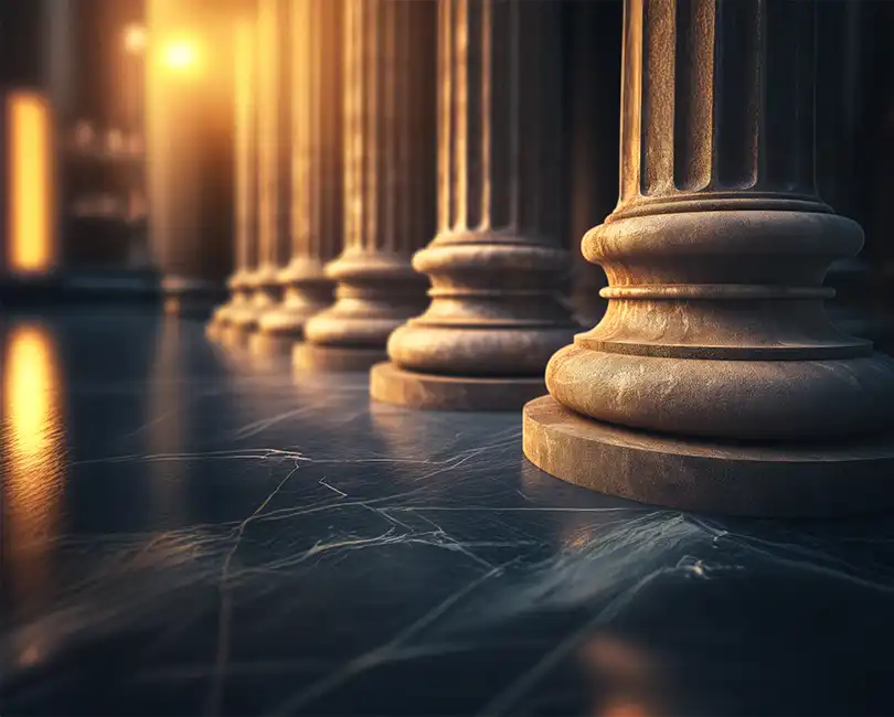 Photorealistic image of classical architectural stone pillars in a row with warm sunlight, illustrating the foundational pillars of AEC M&A due diligence: financial, tax, talent, and culture
