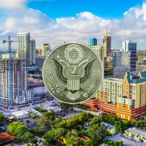 Aerial view of Ft. Lauderdale city skyline and construction with the Great Seal of the United States.