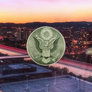 Irvine, CA city skyline at sunset with the Great Seal of the United States centered for SN's FAR & AASHTO training.