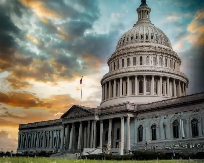 The US Capitol Building at dusk with the text 'One Decision, Two Rulebooks: How Tax Planning Can Affect Your AEC Firm's Overhead Audit' by Marla Miller, CPA, JD